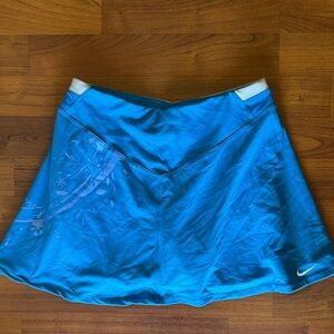 Nike Women's Turquoise Blue Athletic Skirt with Subtle Floral Print